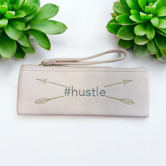 HUSTLE FAUX LEATHER WRISTLET